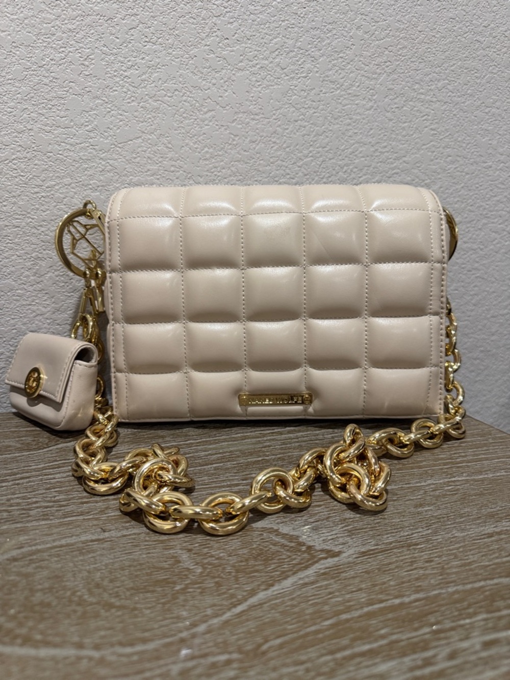 Naked Wolfe Quilted Cream Crossbody with Gold Chain